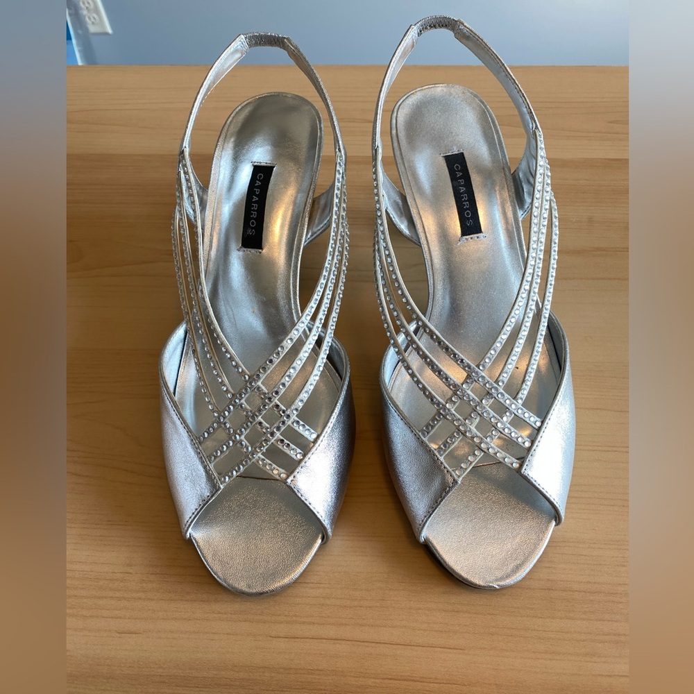 Caparros silver dress sandals size 8 1/2. Never worn.